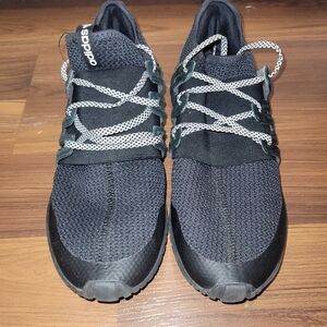 Adidas triple black tubular radial core sneakers